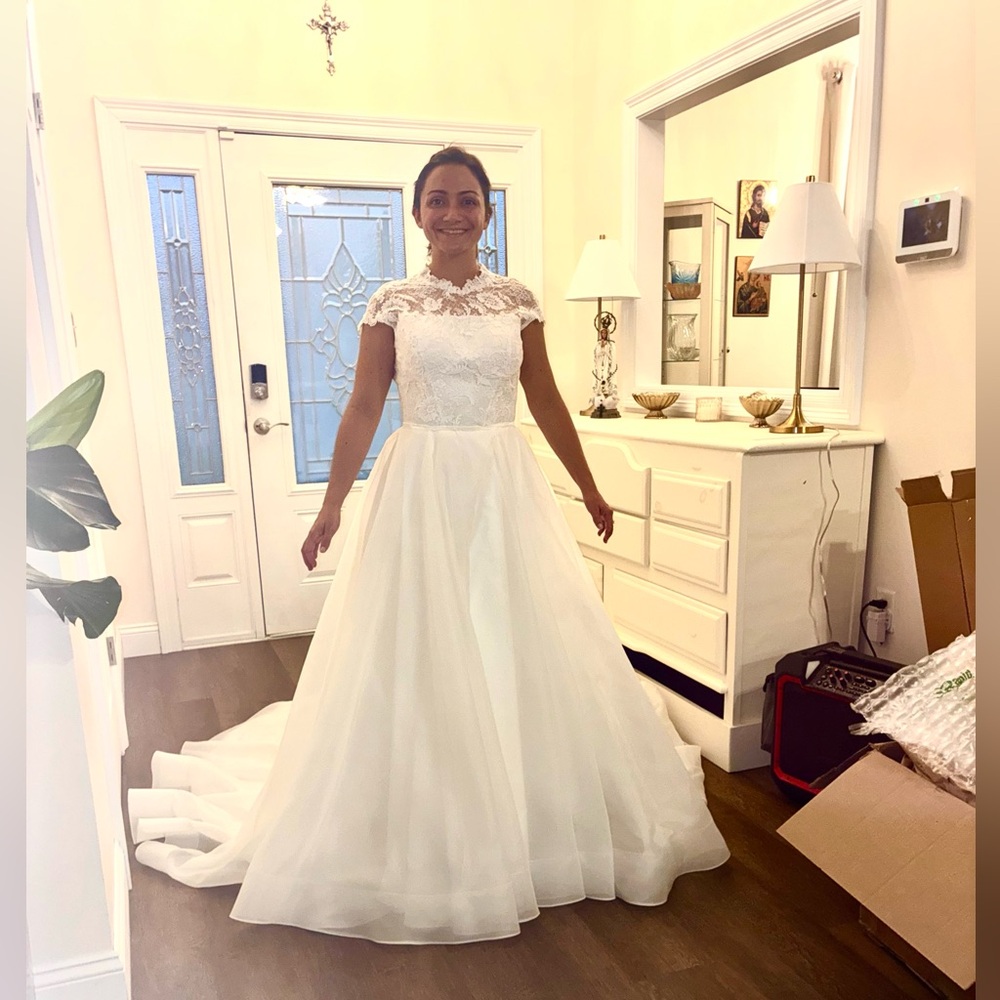 Never worn modest and petite wedding dress